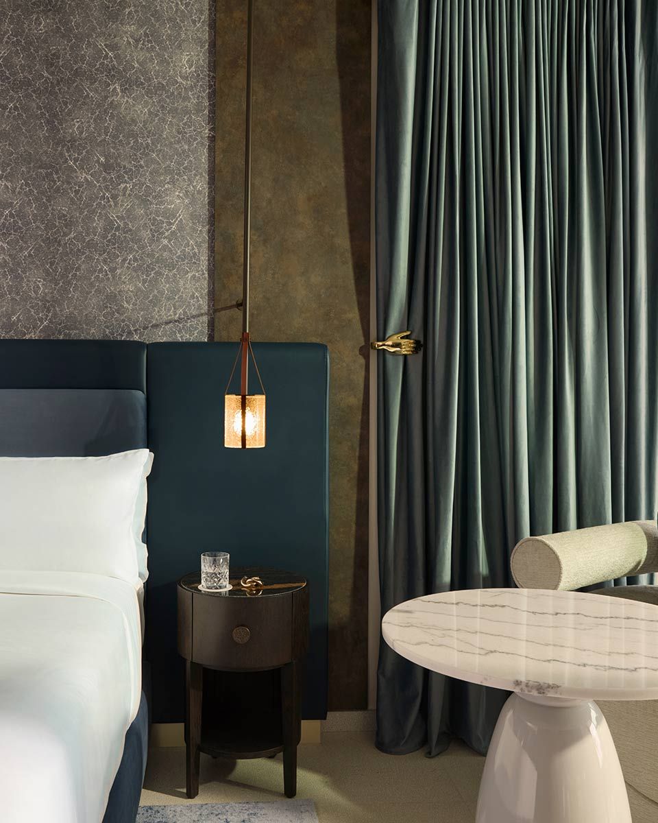 Guest room at SLS Barcelona with a marble side table